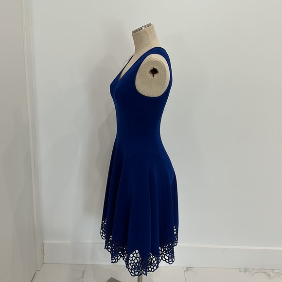 Classic style combines with modern, edge trend for a dress that is flattering. - Picture 5 of 8